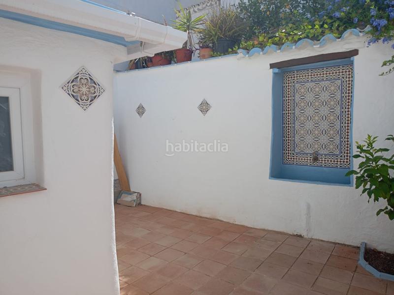 Foto 1661839d-ad01-4b8d-a7cc-4b911ba6c125. Casa adosada encantadora casa reformada 3 dormitorios, terraza y patio andaluz a 5 min del centro en Alozaina