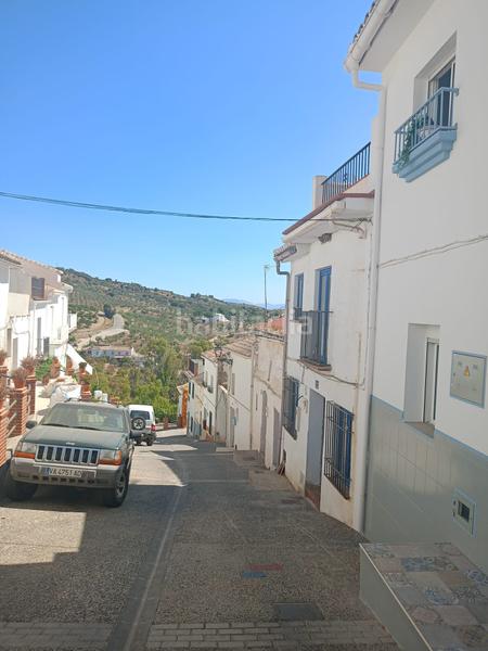 Foto 45410d48-1c4b-4ea0-afa0-18e66043f52b. Casa adosada encantadora casa reformada 3 dormitorios, terraza y patio andaluz a 5 min del centro en Alozaina