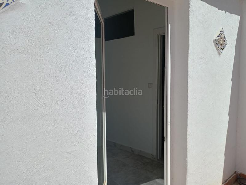 Foto 6612a4d3-23ff-474d-8aa8-6ee8331ac28d. Casa adosada encantadora casa reformada 3 dormitorios, terraza y patio andaluz a 5 min del centro en Alozaina