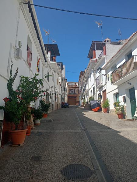 Foto 9cd5d088-3c58-4671-a4e0-79996fc13dfa. Casa adosada encantadora casa reformada 3 dormitorios, terraza y patio andaluz a 5 min del centro en Alozaina