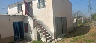 Terreny residencial a Coín. Finca de 1.000m con casa, nave, pozo y árboles frutales!!  ideal
