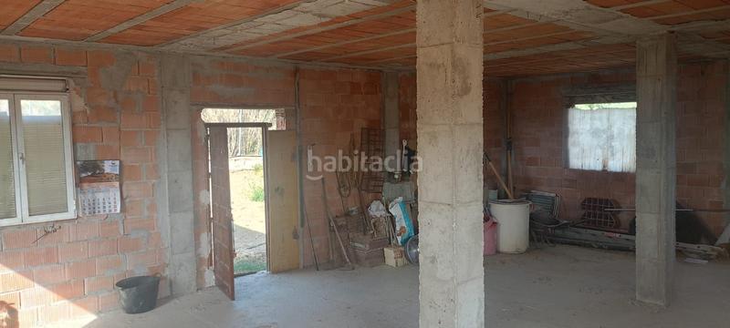 Foto 8ee45b34-10d9-4030-90d4-45bb8c3ad53c. Terreno residencial preciosa finca con 2 casas en construcción, olivar y gran potencial en Coín