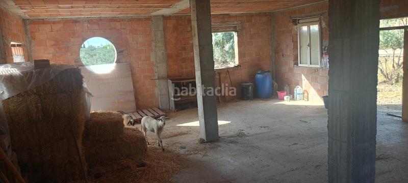 Foto 96f44074-43f4-4bcd-a71b-06facb4b49dd. Terreno residencial preciosa finca con 2 casas en construcción, olivar y gran potencial en Coín