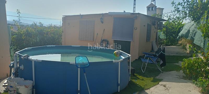 Foto adb0b620-f016-42a3-83ba-de24ce568de4. Terreno residencial preciosa parcela rural dos casas, olivar y gran potencial en Coín