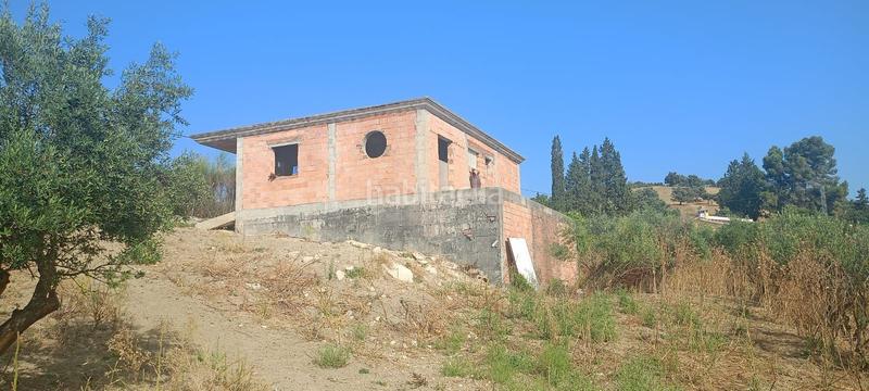 Foto ca9fa3dc-d8d6-4494-903a-c641aa6a8107. Terreno residencial preciosa parcela rural dos casas, olivar y gran potencial en Coín