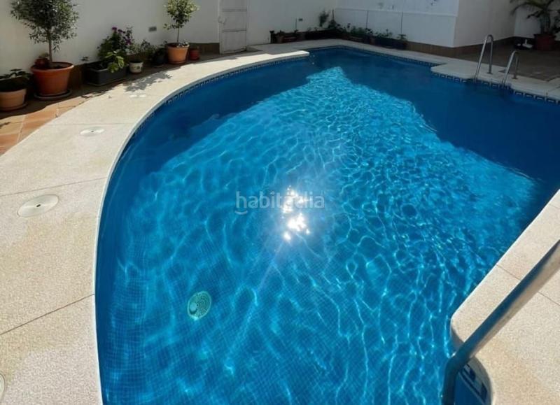 Foto d07bc9f9-5939-4b08-bbac-dd59d7527b1f. Piso gran piso de 2 dormitorios con garaje privado y piscina con todo el lujo y comodidades en Alozaina