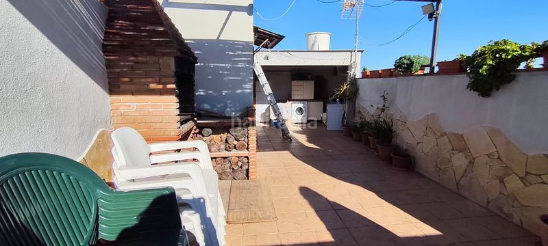 Foto 598e06ba-f33b-4817-944f-92326d5667cd. Casa adossada amb calefacció a Coín
