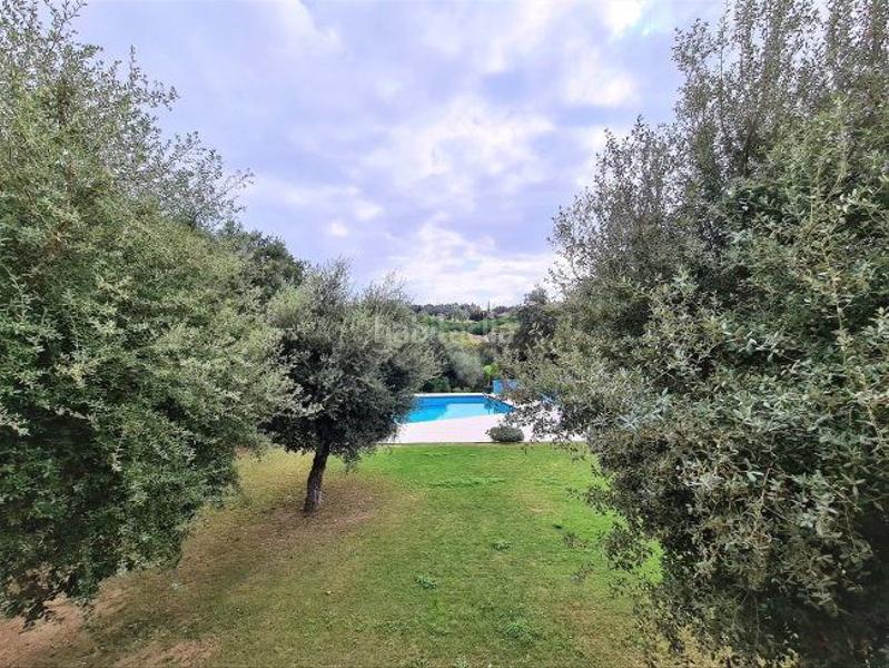 Foto ac0ee485-b4df-4684-8f15-b0e914c9e758. Xalet amb aparcament piscina a Sotogrande alto Sotogrande