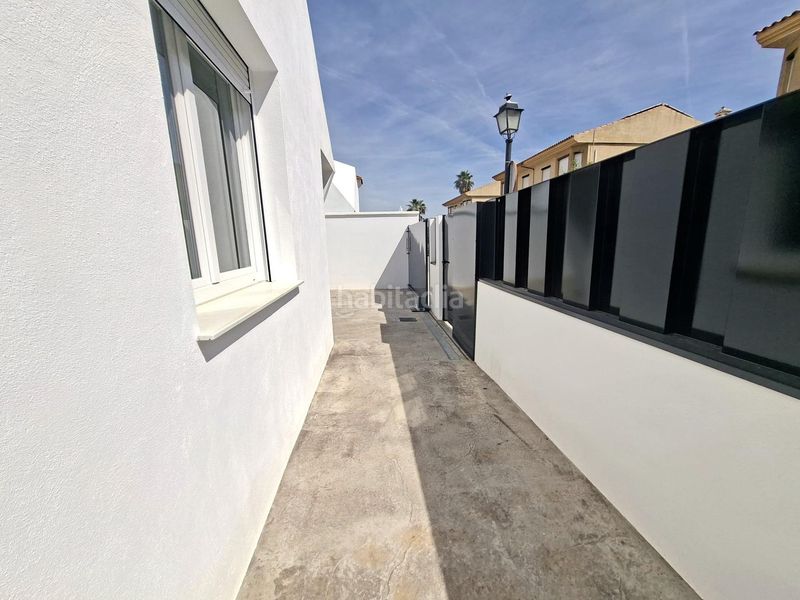 Foto b7386a19-414d-442e-8fb1-9061d083c80c. Casa adossada a Belicena Vegas del Genil