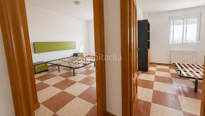 Foto 182ecccf-6108-4033-8092-c5b501fdd637. Casa adossada amb aparcament a San Francisco - El Chorrillo Gabias (Las)
