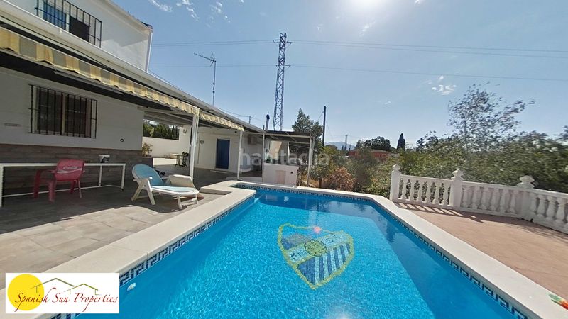Foto 39c525e6-82c2-4dc4-a2f9-c0977bf9b552. Xalet amb xemeneia aparcament piscina a Coín