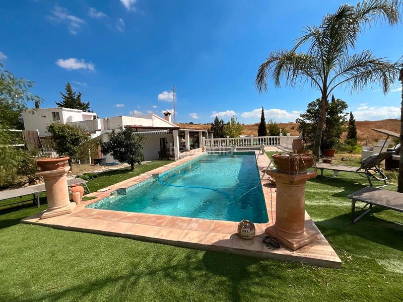 Foto 157d17ad-b0be-4ea8-8b55-46d8075a890c. Mas avec cheminée piscine dans Coín