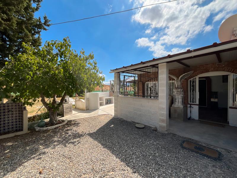 Foto 64dbd9e3-fd9e-4bfd-9b8d-cfd24e28c929. Mas avec cheminée piscine dans Coín