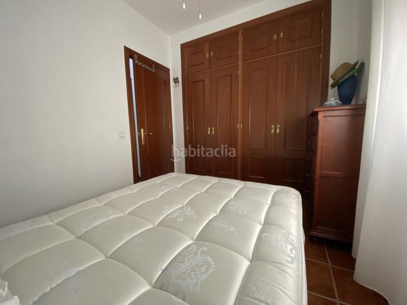 Foto 566e05cc-0112-4fa7-abe8-5a557e56bfa3. Piso  acogedor con piscina y garaje en urbanización tranquilale presentamos esta excelente vivienda situada en la primera planta de en Chipiona