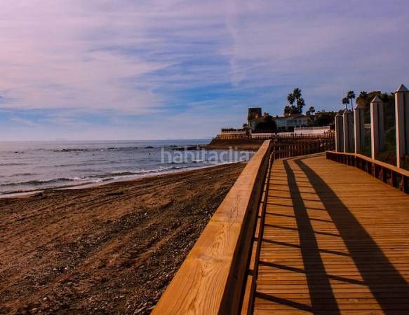 Foto e15f945f-d0db-41cf-b0d1-aa002d21e4a8. Casa adossada a calle diamante 12 a Riviera del Sol Mijas