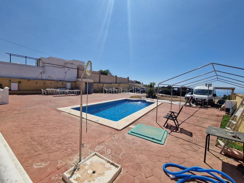 Foto 0af0dfaa-33b3-4c34-8e21-c05e25572e74. Chalet avec chauffage parking piscine dans Añoreta Baja Rincón de la Victoria