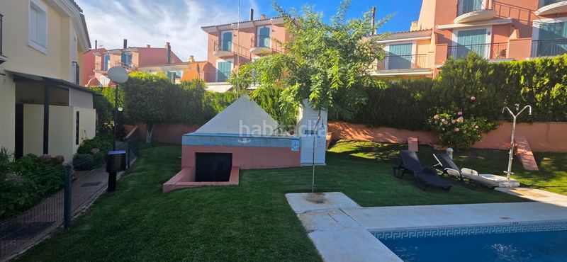 Foto 575c8b15-dd29-46b1-99cf-f9f74e2aa3d7. Casa adossada amb aparcament piscina a Islantilla golf Islantilla