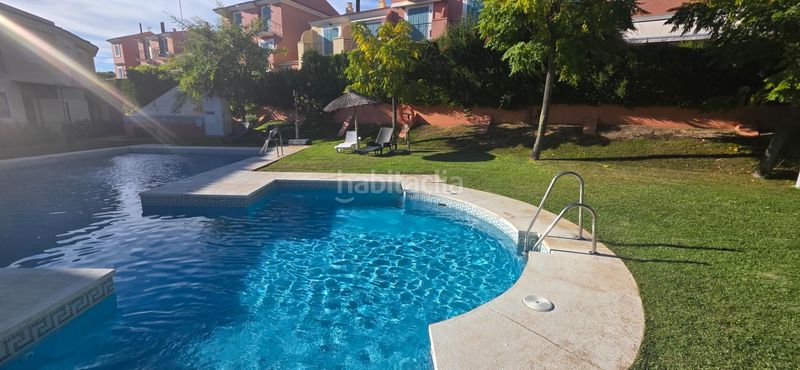 Foto ac21bd2e-e175-48b9-a972-49a2b78217e2. Casa adossada amb aparcament piscina a Islantilla golf Islantilla