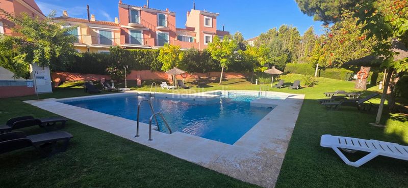 Foto b9ba11a6-d5c2-4257-a465-59697f06806f. Casa adossada amb aparcament piscina a Islantilla golf Islantilla