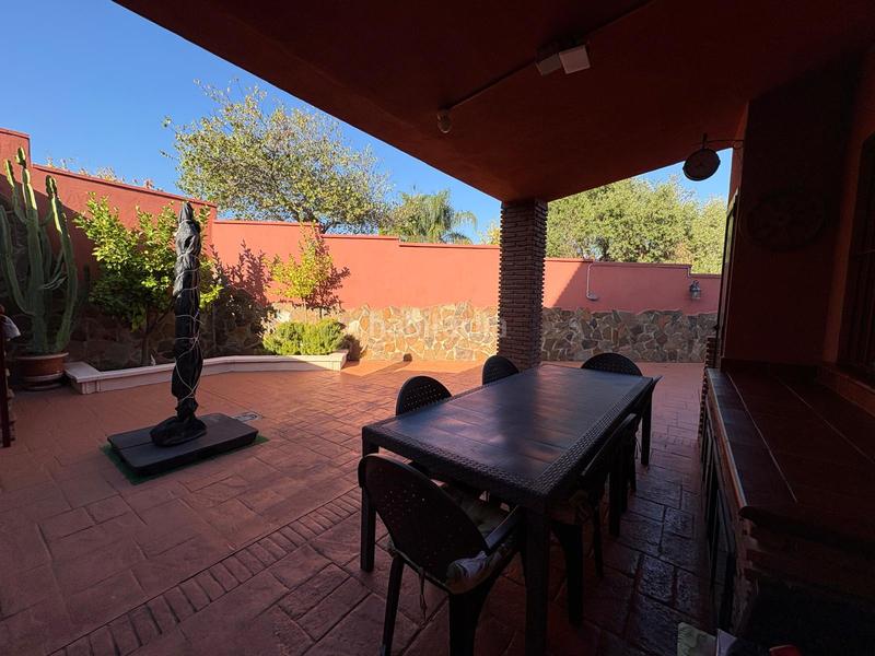 Foto df73c3b4-f17f-43b2-bae1-ac7c790a04fe. Maison jumelée avec cheminée parking dans San Bernabé Algeciras