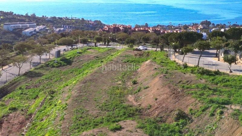 Foto 03d54f19-710d-4ea4-b3ec-c7ececa5056f. Finca rústica parcela urbanizable con vistas al mar en bahía de las rocas en Manilva