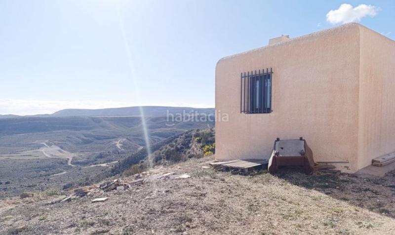 Foto b015d1b7-a1e8-4bc7-aea1-3c427d031d2c. Xalet amb xemeneia aparcament a Aguamarga Níjar