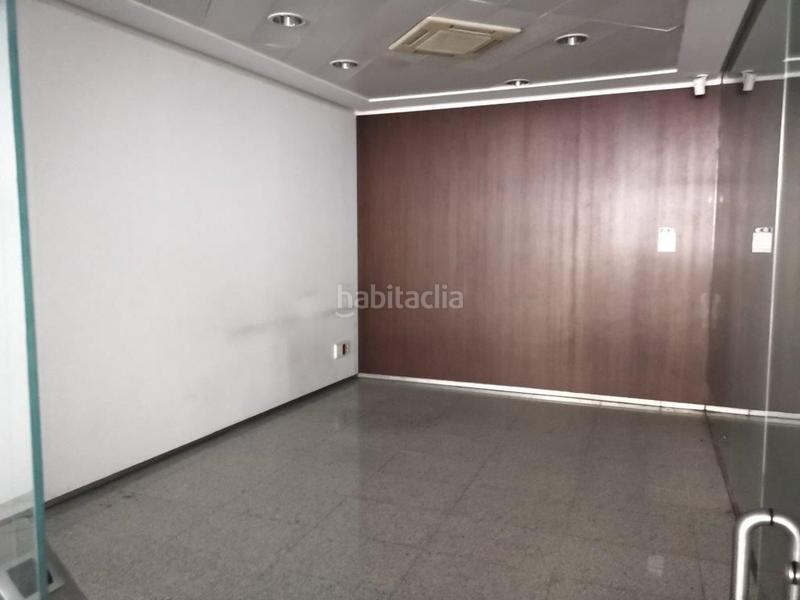 Foto 92f6a118-f792-48c0-84ad-00a99fd7cc5c. Local commercial dans calle amador de los ríos 6 dans Sevilla