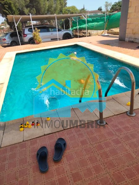 Foto 00917d4a-c332-40b0-b119-0af08dc1b696. Casa amb xemeneia aparcament piscina a Gibraleón