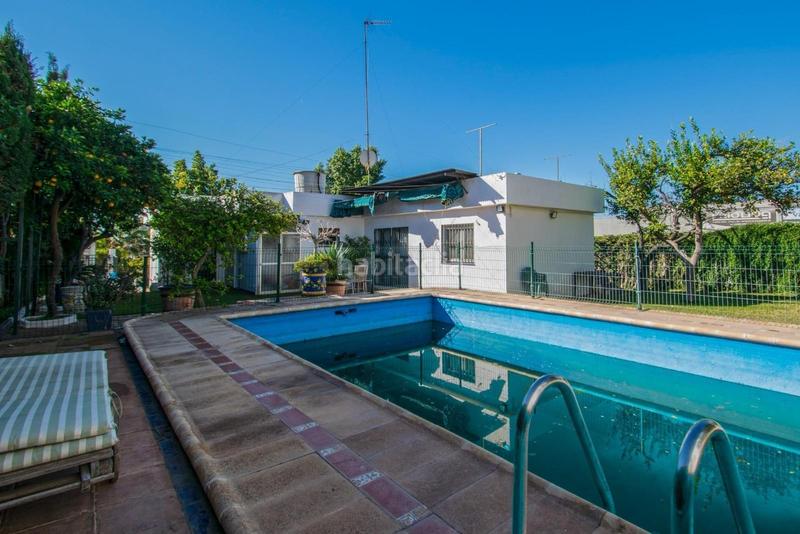 Foto b5d8e3fc-440d-45fd-8079-ae4323555057. Casa con parcheggio piscina in La Paz Alcalá de Guadaira