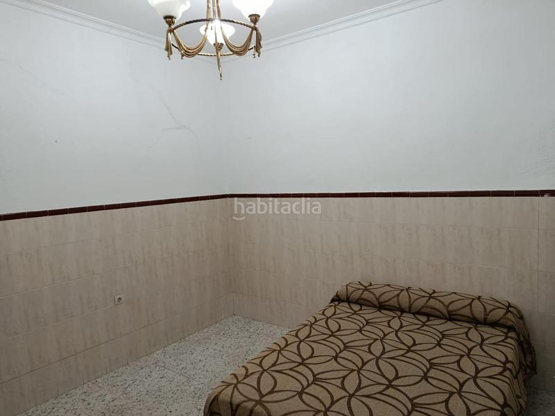 Foto ebcb4ee7-b973-49c4-b79c-fd1db5a24869. Casa adossada amb aparcament a Barrio del Nervión Sevilla