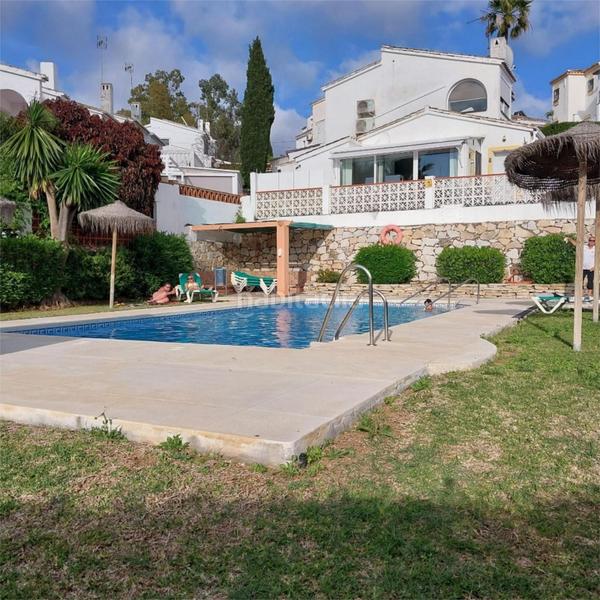 Foto 68f0419d-005f-4606-8aef-97db06ad5704. Semi detached house with parking pool in Calahonda Mijas