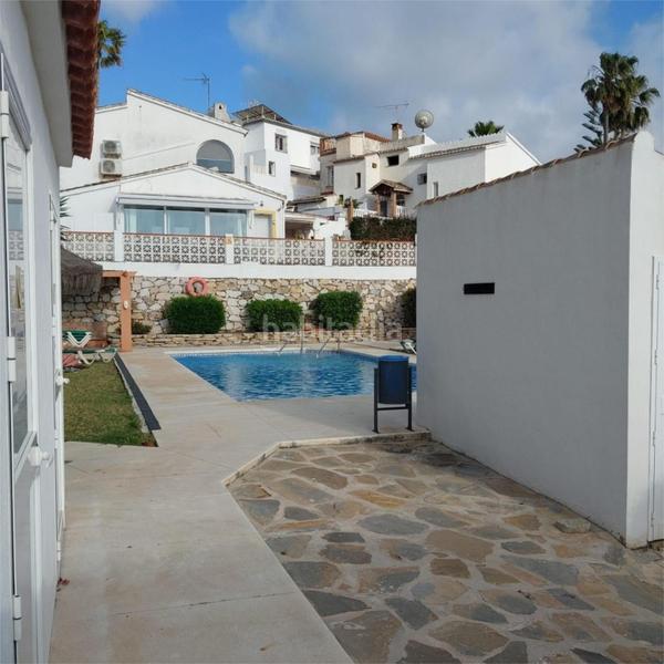 Foto 92e447b7-b25a-4617-8241-834e51157e3e. Semi detached house with parking pool in Calahonda Mijas