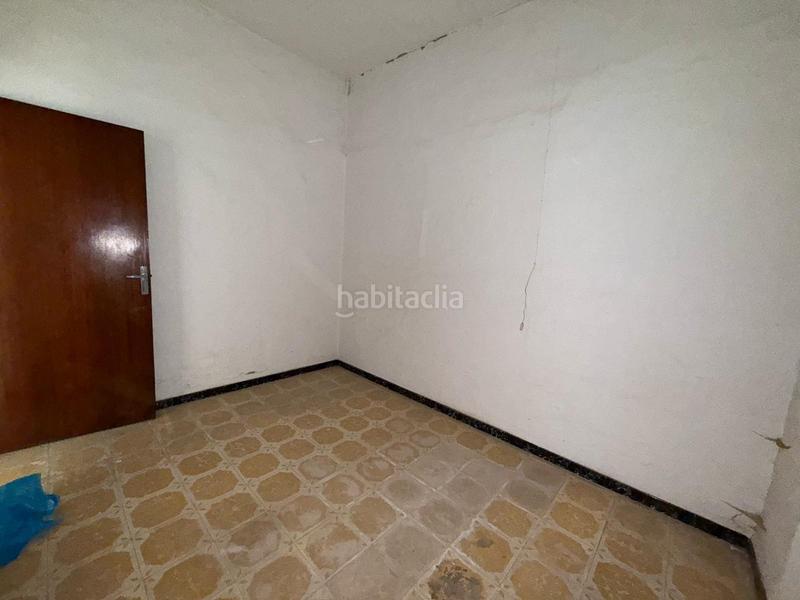 Foto 7c749690-c42c-4426-8b36-2b0fd7a71cd5. Casa adossada a Pilas