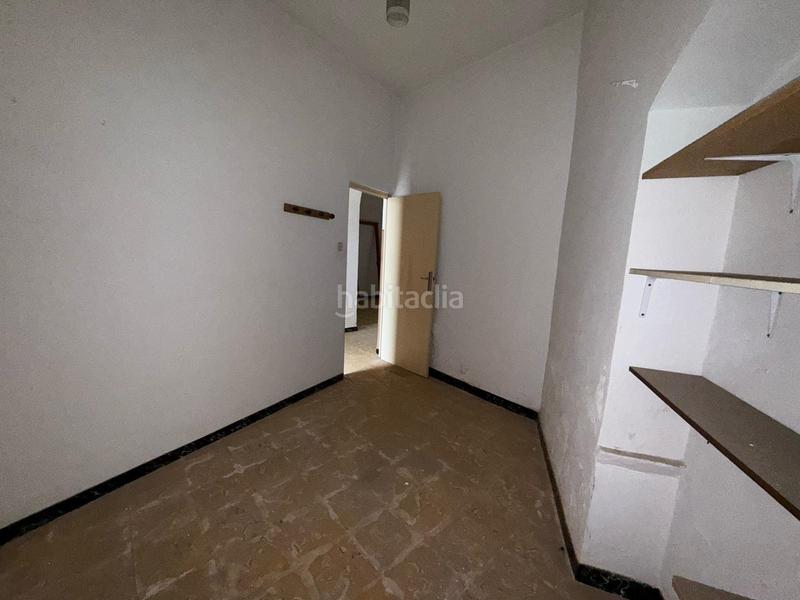 Foto ff2b90d9-cf64-4730-8346-ba98fcbfdd7f. Casa adossada a Pilas