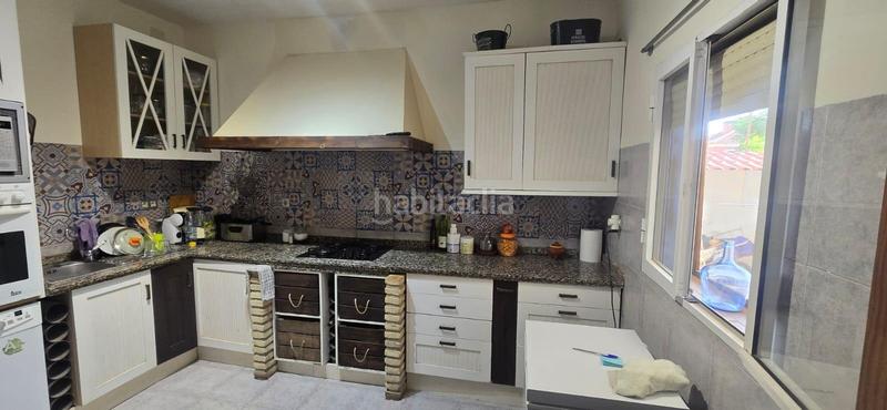 Foto dd08ea47-6251-4c2c-8a89-27fbc877d3f4. Casa a schiera con parcheggio in Espartinas pueblo Espartinas