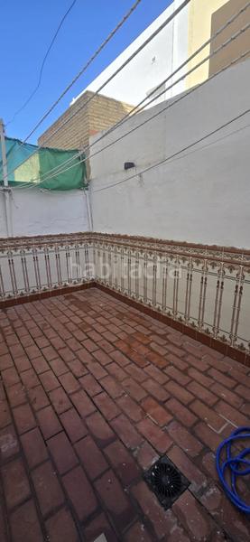 Foto 0508a56e-bd6e-43f7-86c2-0a8ea14b44dd. Casa adossada amb aparcament a Puebla del Río (La)