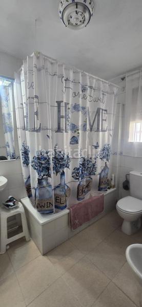 Foto 277babf5-5df4-4746-9332-3a29183a63d4. Casa adossada amb aparcament a Puebla del Río (La)