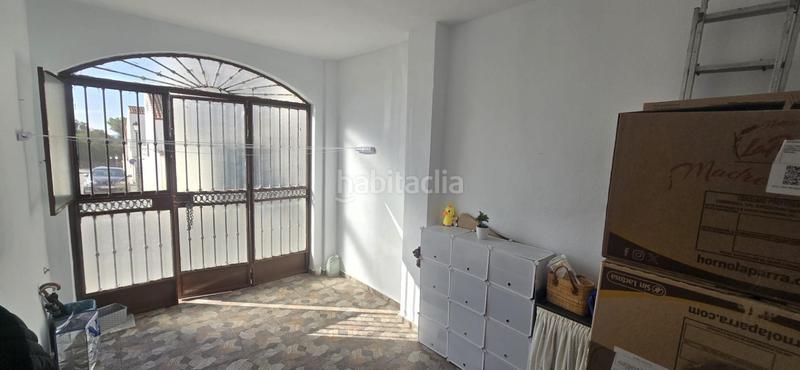 Foto 52d8c3d6-9b21-4a5e-aec7-8215d1122369. Casa adossada amb aparcament a Puebla del Río (La)