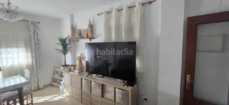 Foto 6638c904-bc5e-4ae2-a96f-a7a088c504f9. Casa adossada amb aparcament a Puebla del Río (La)