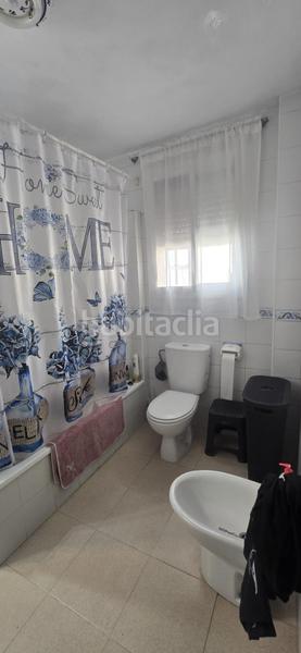 Foto 79965135-b35b-4012-aecf-b8334e6260c4. Casa adossada amb aparcament a Puebla del Río (La)