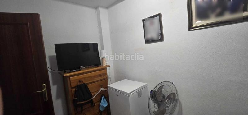 Foto 8a3570af-4bc8-4a15-a539-6140bcccd5ab. Casa adossada amb aparcament a Puebla del Río (La)