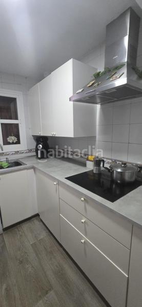 Foto 94e85387-3cd5-477f-b103-3a29b0dc9664. Casa adossada amb aparcament a Puebla del Río (La)