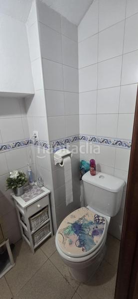 Foto 9afbb285-087c-4fa1-96c4-505a047416fc. Casa adossada amb aparcament a Puebla del Río (La)