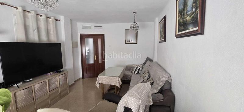 Foto c20e0a01-365e-4cc9-8f70-7a0470486b3a. Casa adossada amb aparcament a Puebla del Río (La)