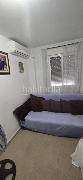 Foto c941791a-9d96-4011-a1cd-34a9a71c86fc. Casa adossada amb aparcament a Puebla del Río (La)