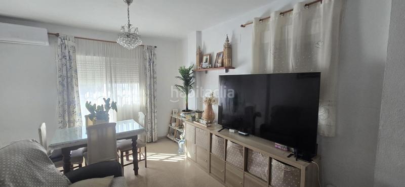 Foto c987539c-fae1-4c75-92fb-a5a2b7208117. Casa adossada amb aparcament a Puebla del Río (La)