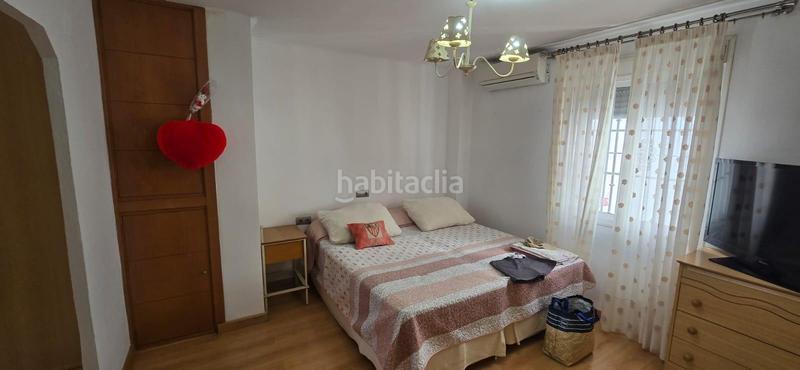 Foto 20d486d2-fb11-45f0-993b-5cc64357503e. Casa adosada en colores - entreparques Sevilla