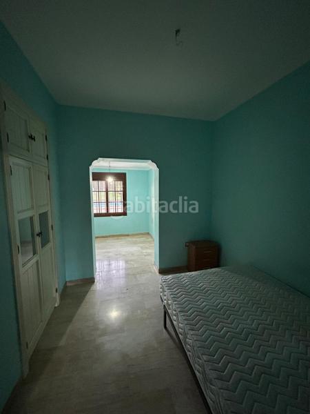 Foto 5dc7a7bd-94fa-4a8d-8c7b-8564a01efd68. Chalet avec parking piscine dans La Paz Alcalá de Guadaira