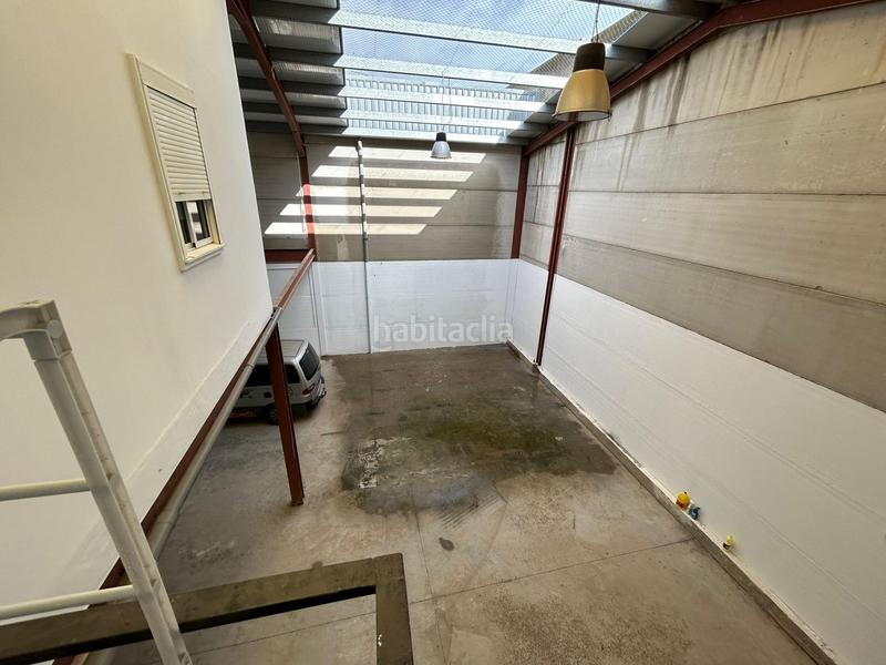 Foto 260db4a4-6440-48ce-8fe4-0d338c701d4f. Bâtiment à usage industriel dans Alcalá del Río