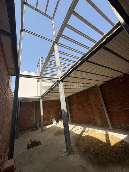 Foto 7d7f9f54-e63b-4355-8311-a41ead13f9cc. Casa adossada a Amate Sevilla